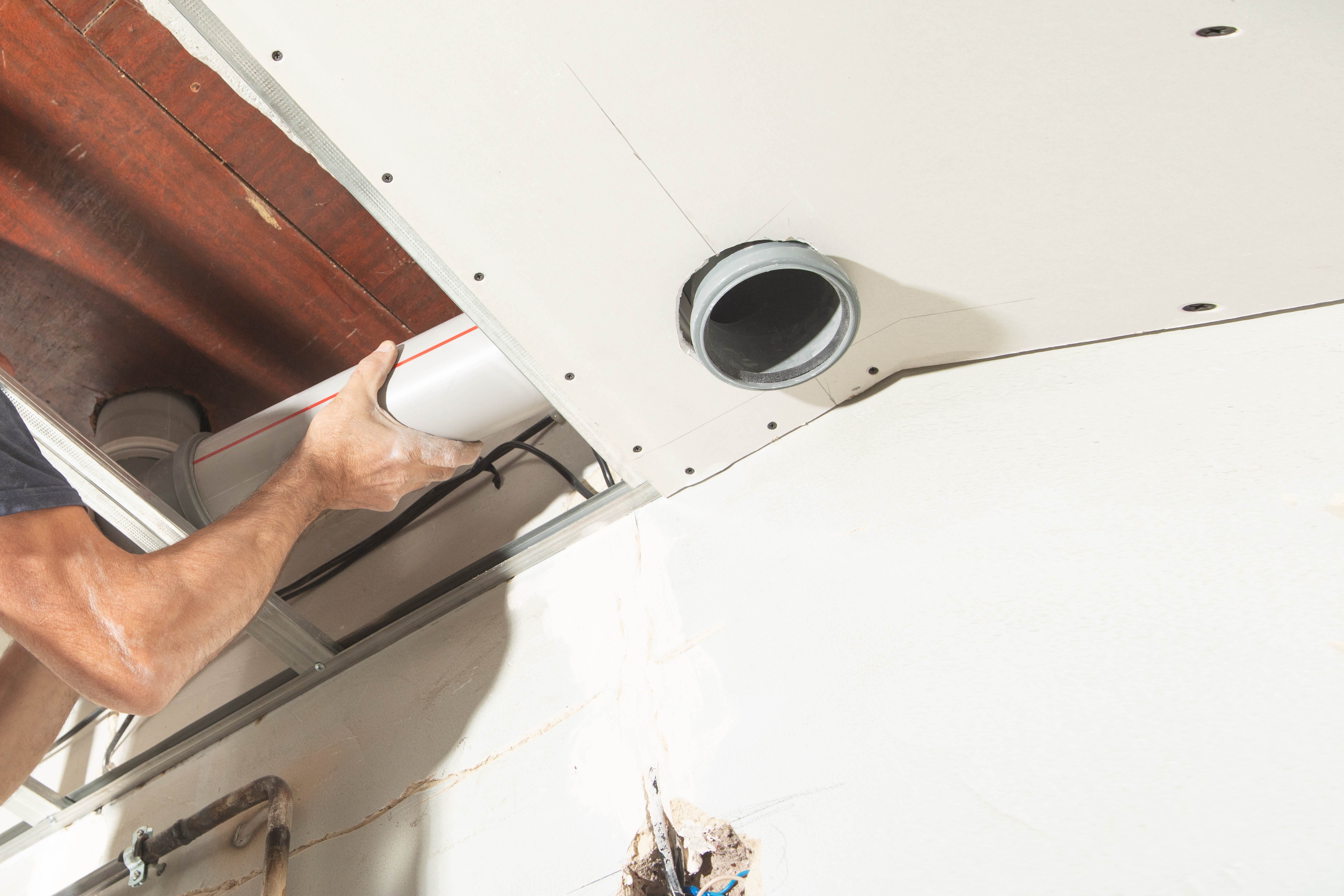 A completed HVAC system can be see in an open ceiling concept of a commercial
style building.
